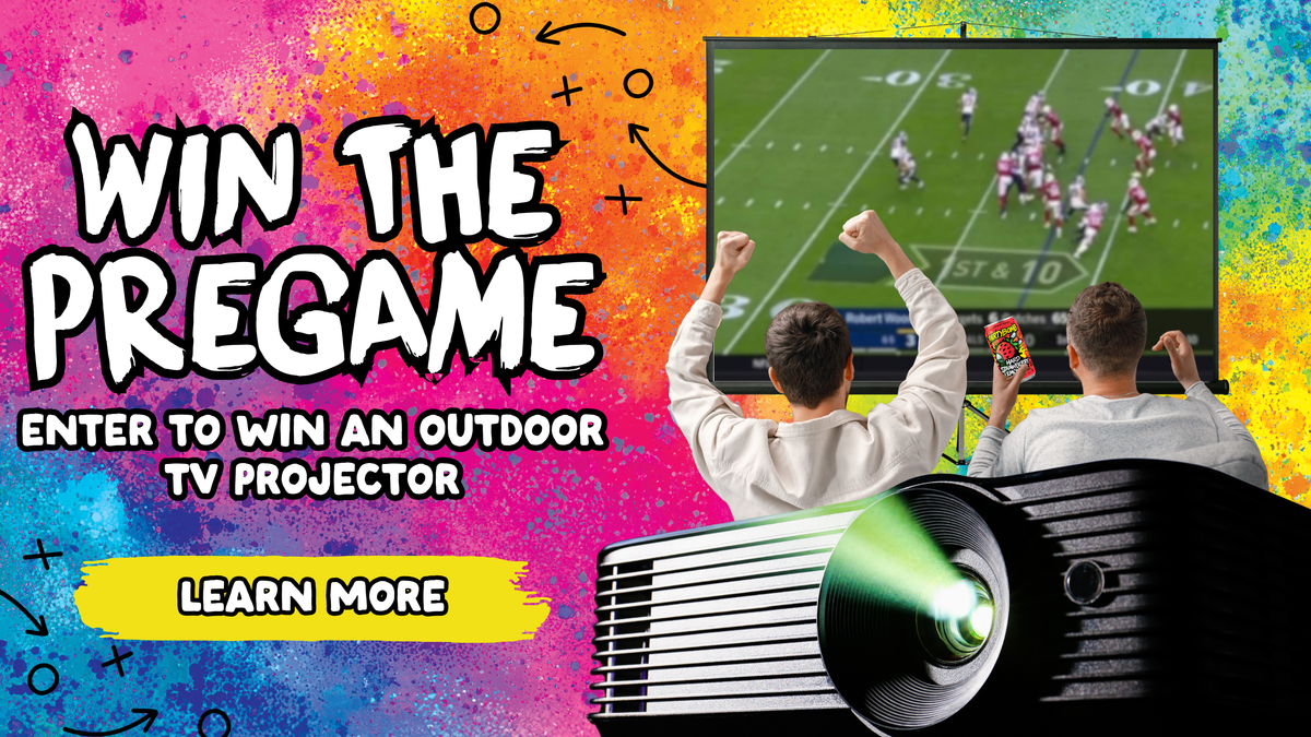 Promotional graphic for a TV projector giveaway, showing a large screen with a football game, two people cheering in front of the TV, and a projector casting light. Bold text reads 'WIN THE PREGAME' and 'ENTER TO WIN AN OUTDOOR TV PROJECTOR' on a colorful splattered background.